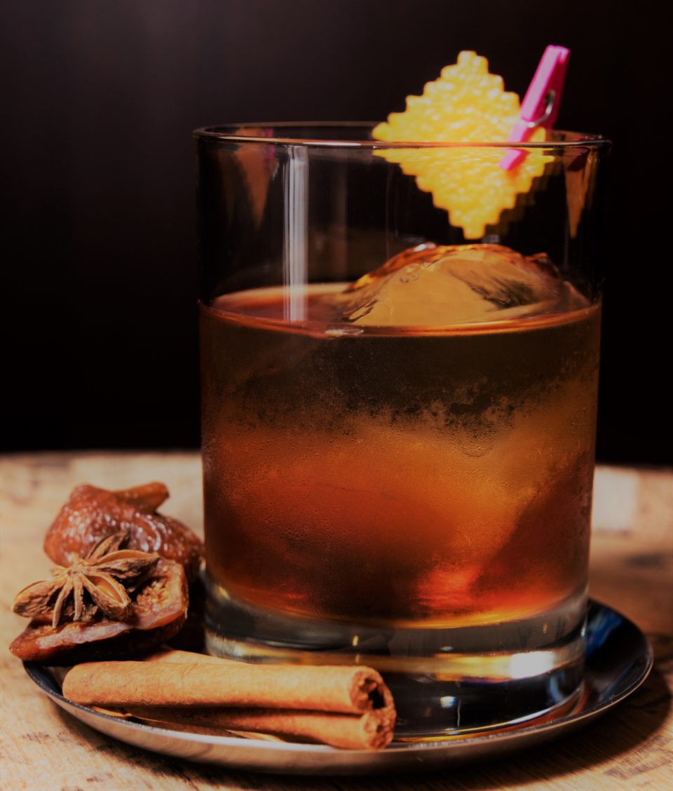 a photo of a smoked old fashioned